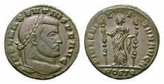 Maxentius Æ Follis. Maxentius Æ Follis. Ostia, AD 309-312. IMP C MAXENTIVS P F AVG, laureate head right / FIDES MILITVM AVG N, Fides standing left with standard in each hand, MOSTQ in exergue. C. 71; 