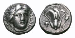Islands off Karia, Rhodos AR Didrachm. Islands off Karia, Rhodos AR Didrachm. Rhodes, circa 340-316 BC. Head of Helios facing slightly right / Rose with bud to right; grape bunch and E to left; all wi
