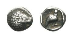 Ionia, Miletos AR Tetartemorion. Late 6th-early 5th century BC. Head of roaring lion right / Bird standing right within incuse square. Rosen 408. 0.23g, 5mm. Toned, Very Fine.
