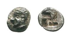 Ionia, Phokaia AR Tetartemorion. Late 6th century BC. Archaic head of Athena(?) left / Four-part incuse punch. Cf. SNG Kayhan 522 (Diobol). 0.18g, 6mm. Toned, Very Fine. Rare.