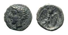 Sicily, Katane Æ Tetras. Circa 405-402 BC. Head of the river god Amenanos left; ivy leaf behind / Winged thunderbolt; three pellets around. CNS III, 1; SNG ANS 1272. 0.78g, 9mm, 7h. Very Fine.