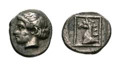 Ionia, Phokaia AR Tetartemorion. Circa 480 BC. Head of Apollo left / Head of griffin left within linear square. SNG Copenhagen 1033 var. 0.31g, 8mm, 9h. Extremely Fine, toned and of fine early classic