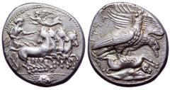 Sicily, Akragas AR Tetradrachm. Circa 409-406 BC. Nymph or goddess driving quadriga galloping to right, about to turn, her robes billowing behind her; Nike above, flying left to crown the charioteer; 