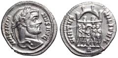 Maximian AR Argenteus. Rome, AD 295-297. MAXIMIANVS AVG, laureate head right / VIRTVS MILITVM, the four tetrarchs sacrificing over tripod before city enclosure with six turrets, Δ in exergue. RIC 40b;