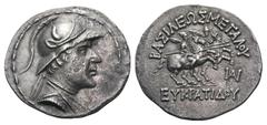 Baktria, Greco-Baktrian Kingdom. Eukratides I Megas AR Tetradrachm. Circa 170-145 BC. Diademed and draped bust right, wearing crested helmet adorned with bull's horn and ear / The Dioskouroi on horseb