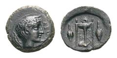 Sicily, Leontini Æ Tetras. Circa 405-402 BC. ΛEON, laureate head of Apollo right; laurel leaf with berry behind / Tripod, lyre behind central leg, barley grain on either side; three pellets in exergue