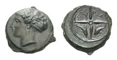 Sicily, Syracuse Æ Tetras. Dionysios I, circa 415-405 BC. Head of Arethusa left with hair in ampyx / ΣY-PA and two dolphins within spokes of wheels. CNS II, 19-23; HGC 2, 1479. 3.69g, 16mm, 3h. Good V