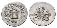 Lydia, Tralleis AR Cistophoric Tetradrachm. Circa 140/135. Cista mystica with serpent in ivy wreath / Bow-case between two serpents, star above, head of Helios right. 12,63 g. Kleiner & Noe 68ff. 12.6