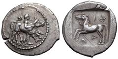 Thessaly, Larissa AR Drachm. Circa 475-425 BC. Thessalos advancing right, with petasos over his shoulders and chlamys tied at his neck, holding a band around the forehead of a bull rushing to right, l