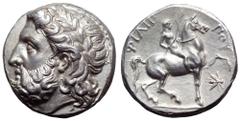 Kingdom of Macedon, Philip II AR Tetradrachm. Pella, circa 323-315 BC. Laureate head of Zeus to left / Nude rider on horseback to right, holding long palm branch in his right hand, ΦΙΛΙΠΠOΥ above, bee