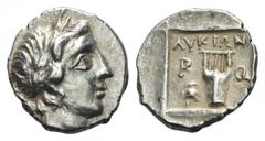Lycia, Rhodiapolis as a member of the Lycian League AR Drachm. Circa 167-81 BC. Laureate head of Apollo right, bow and quiver over shoulder / City initials P-O on either side of a kithara, ΛVKIΩΝ abov