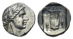 Lycia, Phaselis as member of the Lycian League AR Drachm. Circa 167-100 BC. Laureate head of Apollo right; bow and quiver over shoulder / Kithara; thunderbolt to left; torch to right; all within incus