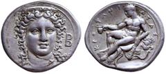 Bruttium, Kroton AR Stater. Circa 400-325 BC. Head of Hera Lakinia facing slightly right, wearing necklace and stephane decorated with palmettes; B to right / Young Herakles, nude, holding cup in exte