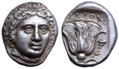 Islands off Karia, Rhodos, Rhodes AR Tetradrachm. Circa 404-385 BC. Head of Helios facing slightly right / Rose with bud to right; POΔION above, grain ear and Δ to left; all within incuse square. Heca