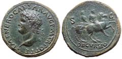 Nero Æ Sestertius. Lugdunum (Lyon), circa AD 67. IMP NERO CAESAR AVG P M TR POT P P, laureate head left, with small globe at point of bust / DECVRSIO in exergue, S-C across fields; Nero on horseback r
