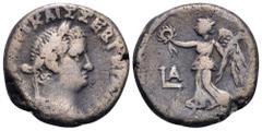 Vitellius BI Tetradrachm of Alexandria, Egypt. Year 1 = AD 69. Laureate head right / Nike flying left, holding wreath and palm; LA in left field. Emmett 196; RPC 5372 (18 specimens). 12.86g, 23mm, 12h