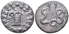 Lydia, Tralleis AR Cistophoric Tetradrachm. Circa 155-145 BC. Cista mystica with serpent; all within ivy wreath / Bow-case with serpents; TPA to left, filleted tripod to right. Kleiner-Noe Series 23. 