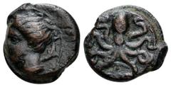 Sicily, Syracuse Æ Tetras. Second Democracy. Circa 440-430 BC. Head of Arethusa left, dolphins flanking / Octopus. Boehringer 623; CNS 12; SNG ANS -; Lindgren 551; Morcom 694; Hunter 36. 3.38g, 14mm, 