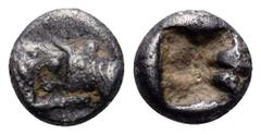 Kings of Lydia, Kroisos AR 1/12 Stater. Circa 560-546 BC. Confronted foreparts of lion and bull / Incuse punch. Berk 26-7; SNG Kayhan 1020. 0.61g, 7mm. Near Very Fine, toned, light porosity. From the 