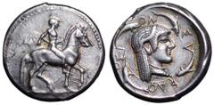 Sicily, Syracuse AR Didrachm. Deinomenid Tyranny. Time of Gelon I, circa 490-485 BC. Nude rider on horseback right, leading a second horse on far side / Head of Arethusa right within thin linear circl