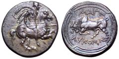 Ionia, Magnesia ad Maeandrum AR Tetradrachm. Circa 350-325 BC. Rhodian standard. Lykomedes, magistrate. Helmeted and cuirassed cavalryman on horseback, galloping right, holding lance in right hand, cl