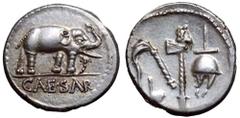 Julius Caesar AR Denarius. Military mint travelling with Caesar, 49-48 BC. Elephant advancing right, trampling on serpent; CAESAR in exergue / Emblems of the pontificate: simpulum, aspergillum, securi