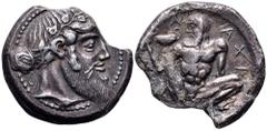 Sicily, Naxos AR Tetradrachm. Circa 460 BC. Bearded head of Dionysos right, wearing ivy wreath, his hair tied in a krobylos behind / Nude, bearded and ithyphallic Silenos squatting facing, head left, 
