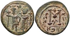 Heraclius and Heraclius Constantine Æ 40 Nummi. Syrian imitative of Constantinople, year 14 = AD 623/4. Heraclius and Heraclius Constantine standing facing between two long crosses, small cross above/
