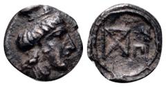 Kephallenia, Paleis(?) AR Tetartemorion. 3rd – 2nd century BC. Female head left, wearing earring and triple necklace, with hair drawn up in a bun / Π X monogram, small Π and kerykeion in right field. 