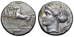 Sicily, Syracuse AR Tetradrachm. Time of Dionysios I, circa 405-400 BC. Charioteer, holding reins and kentron, driving galloping quadriga to left, detached chariot wheel beneath the back hooves of the