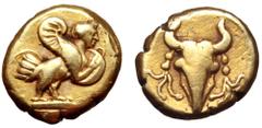 Ionia, uncertain mint EL 1/12 Stater. Circa 5th Century BC. Siren standing right, holding tympanon (tambourine) / Bukranion with fillets hanging from each horn. Rosen 369. 1.00g, 7mm, 10h. Good Very F