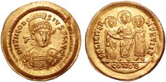 Theodosius II AV Solidus. Constantinople, October AD 437. D N THEODOSIVS P F AVG, pearl-diademed, helmeted, and cuirassed bust facing slightly right, holding spear and shield with horseman motif / FEL