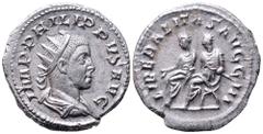 Philip II AR Antoninianus. Rome, AD 244-247. IMP PHILIPPVS AVG, Radiate and draped bust right / LIBERALITAS AVG III, Philip I and Philip II seated left on curule chairs. RIC 230. 4.39g, 22mm, 1h. Near
