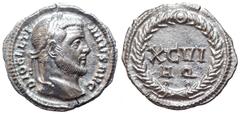 Diocletian AR Argenteus. Aquileia, circa AD 300. DIOCLETIANVS AVG, laureate head of Diocletian to right / XCVI A Q, all within wreath with large central jewel at the top. RIC 16a; RSC 548b. 3.05g, 18m