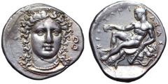 Bruttium, Kroton AR Stater. Circa 400-325 BC. Head of Hera Lakinia facing slightly right, wearing necklace and polos decorated with palmettes; B to right / Young Herakles, nude, holding cup in extende