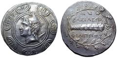 Kingdom of Macedon, Philip V AR Tetradrachm. Pella, circa 202-200 BC. Head of the hero Perseus right, wearing winged helmet surmounted by griffin’s head; harpa in background; all in the centre of a Ma