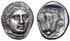 Rhodos, Rhodes AR Tetradrachm. Circa 404-385 BC. Head of Helios facing slightly right / Rose with bud to right; POΔION above, [grain ear and Δ to left]; all within incuse square. Hecatomnus 56 (A37/P4