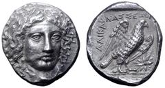 Greek Karia, Halikarnassos AR Tetradrachm. Circa 400-387 BC. Head of Apollo facing slightly right / AΛIKAPNAΣΣEΩN, eagle standing to right, with wings spread, star to right; all within shallow incuse 