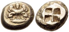 Greek Mysia, Kyzikos EL Stater. Circa 500-450 BC. Double-bodied winged sphinx standing with head facing atop tunny fish to right, wearing ouraios, hair falling in plaited locks behind / Quadripartite 