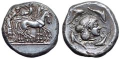 Greek Sicily, Syracuse AR Tetradrachm. Deinomenid Tyranny. Time of Hieron I, circa 475-470 BC. Charioteer, holding kentron and reins, driving slow quadriga right; Nike flying to right above, crowning 