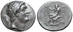 Greek Greco-Baktrian Kingdom, Euthydemos I Theos Megas AR Tetradrachm. Mint B ('Baktra'), circa 210-206 BC. Diademed head right / Herakles seated left on lion skin draped over rocks, holding club set 