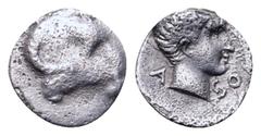 Greek Karia, Halikarnassos (?) AR Hemiobol. Circa 400-340 BC. Head of ram right / Young male head right; Karian legend across fields. SNG Kayhan 997; SNG Keckman 885. 0.35g, 15mm, 2h. Very Fine.