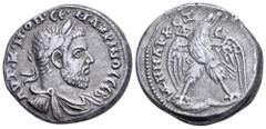 Roman Provincial Macrinus AR Tetradrachm of Antioch, Seleucis and Pieria. AD 217-218. AVT•K•M•OΠ•CԐ•MAKPINOC CԐB, laureate, draped and cuirassed bust right / ΔHMAPX ЄΞ VΠATOΔ, eagle standing facing on
