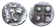 Greek Asia Minor, uncertain mint AR Tetartemorion. Circa 500-480 BC. Head of roaring lion right / Quadripartite incuse square with pellet in each quarter. Leu Web Auction 2, 303; Gitbud & Naumann 6, 9