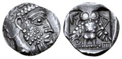 Judaean Philistia, Uncertain mint AR Obol. Circa 450-333 BC. Laureate and bearded male head right / Owl standing facing, wings spread; olive spring to upper left, AΘE around, all within incuse square.