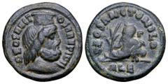 Roman Imperial Anonymous Æ Nummus. Alexandria, time of Maximinus II, AD 310-313. DEO SANCTO SARAPIDI, draped bust of Serapis right, wearing modius / DEO SANCTO NILO, Nilus reclining left, holding bran