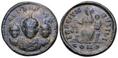 Roman Imperial Theodosius I, with Arcadius and Honorius, Æ Exagium Solidi Weight. Constantinople, circa 402-408. DDD NNN GGG, diademed and draped facing imperial busts / EXAGIVM SOLIDI, helmeted Const