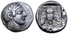 Greek Attica, Athens AR Dekadrachm. Circa 469/5-460 BC. Head of Athena right, wearing single-pendant earring, necklace, and crested Attic helmet decorated with three olive leaves over the visor and a 