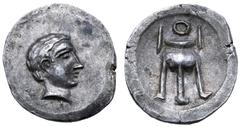 Greek Crete, Axos AR Stater. Circa 4th century BC. Young beardless head of Apollo right with short cropped hair / Tripod with handles and animal feet. Unpublished variant, for general type cf. Le Ride