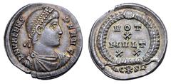 Roman Imperial Valens AR Siliqua. Constantinople, AD 367-375. D N VALENS P F AVG, pearl-diademed, draped and cuirassed bust right / VOT X MVLT XX in four lines within wreath with jewel at apex; (palm)